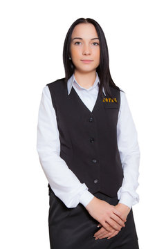 Young Beautiful Woman Brunette Hotel Receptionist In Uniform On White Background Isolated