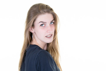 side profile portrait for young woman long hair with makeup in white wall