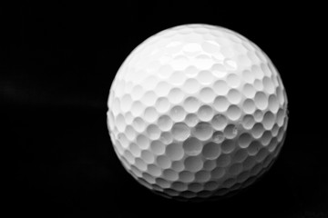 Close Up of Golf Ball, Isolated on Black Background