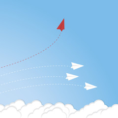 Think different. Think differently concept. Red airplane changing direction. New idea, change, trend, courage, creative solution, innovation and unique way concept. 