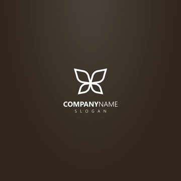white logo on a black background. simple vector outline logo of line art butterfly wings