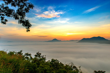 mountains under mist in the morning with sunrise at Phutoke Loei Thailand