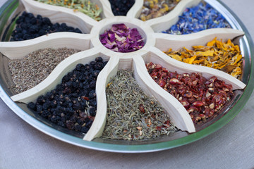 Healthy herbs, herbal tea assortment and berries. Flower and herbal tea.