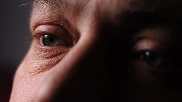 Depressed sad mature man's eyes. Loneliness,depression, sadness