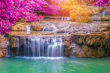 Fototapeta na wymiar Waterfall in Deep forest at Erawan waterfall National Park