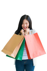 Shopping woman holding bags isolated on white background, consumerism, sale and people concept