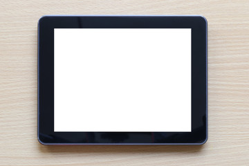 Empty black tablets on wooden floor and have copy space.