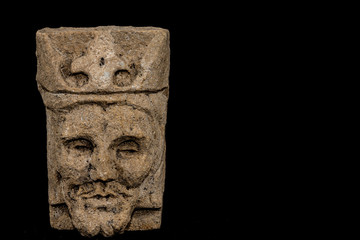 Fototapeta na wymiar stone carving of kings head