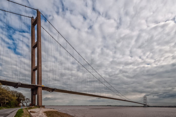 River Humber Suspension Bridge near Hull, UK at high tide 