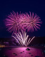 Vivid and colourful firework display at annual British Firework Competition, Plymouth Harbour