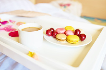 Obraz na płótnie Canvas Romantic breakfast with macarons and coffee
