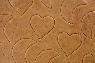 background from ginger dough with ornament from heart and moon