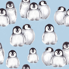 Seamless pattern with baby penguins. Watercolor illustration on blue background.