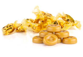 Group of seven whole caramel cream candy butterscotch variety with yellow gliser covered bonbons...