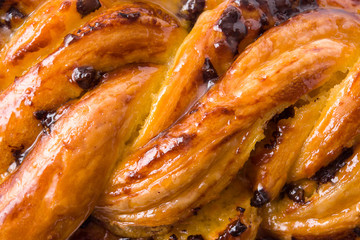 Homemade braid chocolate isolated on white background. Close up

