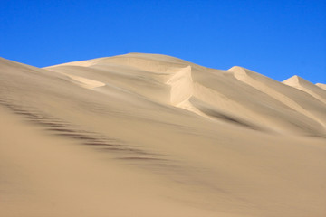 Fototapeta na wymiar Dunes of the Namib desert, outside the town of Walvis Bay, Namibia.