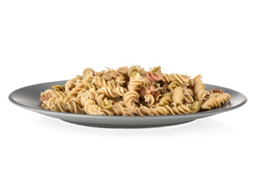 Raw pasta fusilli isolated on white