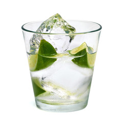 Vodka lime, gin tonic, mojito or Caipirinha cocktail with lime wedge isolated on white background