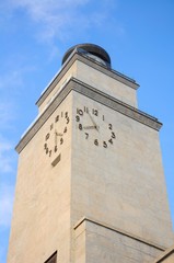 Clock tower in Brescia, Italy. Italian architecture of the year 1932.