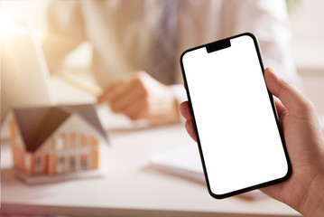 Blanc smartphone screen in architectural office