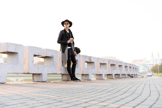 Fashion outdoor photo of stylish handsome man with sunglasses