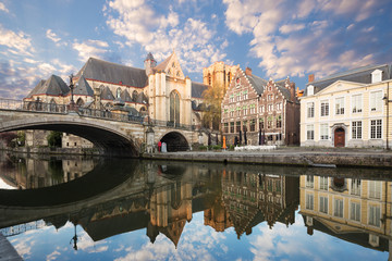 Embankment  along the Leie river with medieval houses in the city of Ghent, Belgium