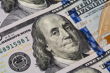 Macro shot of a 100 dollar. Dollars Closeup Concept. American Dollars Cash Money. One Hundred...