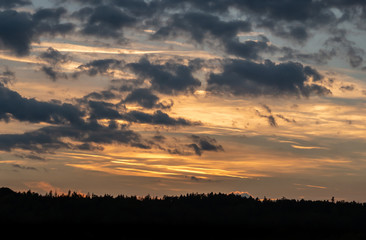 Romantic sunset with black silhouette in the foreground