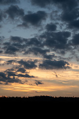 Romantic sunset with black silhouette in the foreground