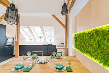 Set wooden table in modern dining room.