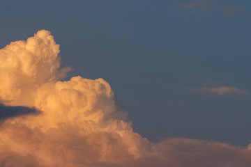 Fototapeta na wymiar Clouds in the evening sky. Sunset Close-up