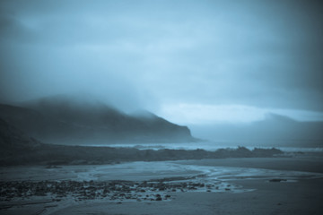 Low Cloud on cliffs and beach