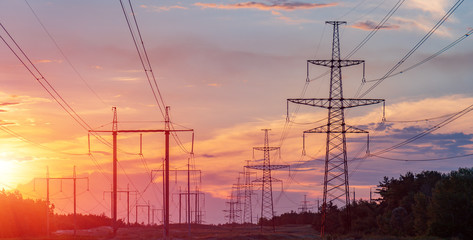 High power electricity poles in urban area. Energy supply, distribution of energy, transmitting...