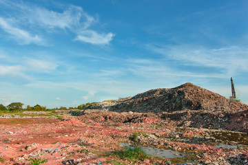 Large plastic garbage dumps from urban areas and industrial estates were dumped outdoors. The problem of pollution and social conflict between the rural poor and the urban population.