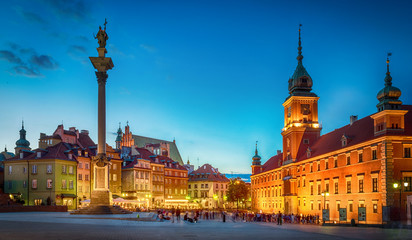 Fototapeta na wymiar Royal Castle, ancient townhouses and Sigismund's Column in Old town in Warsaw, Poland. Night view, long exposure.