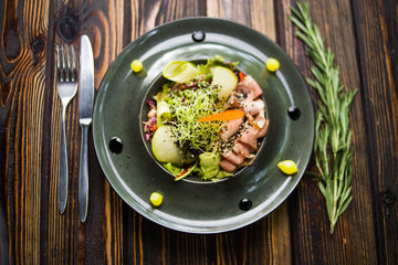 salad with goose and fresh pear