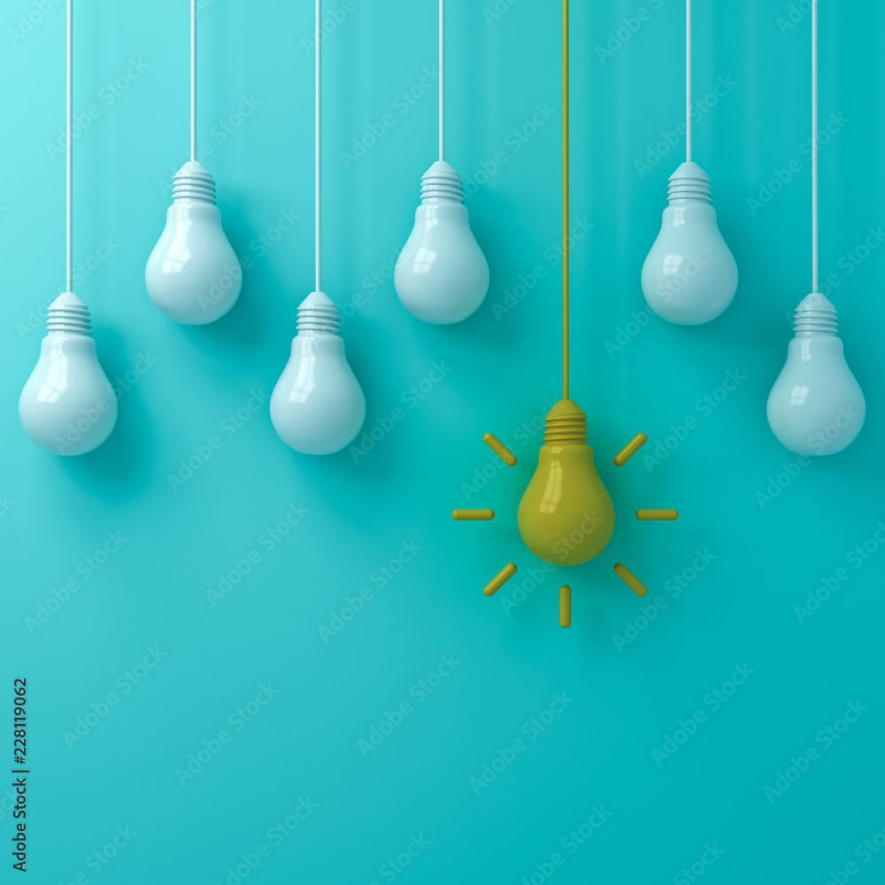 Poster think different concept one hanging yellow idea light bulb standing out from white unlit bulbs on bl