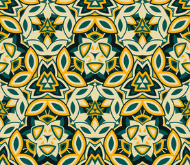 Kaleidoscope seamless pattern, background. Composed of colored abstract shapes. Useful as design element for texture and artistic compositions.
