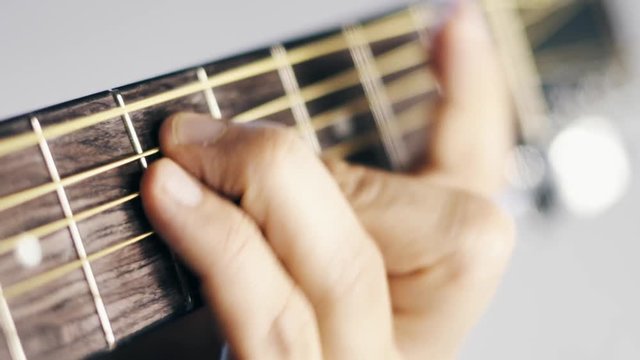 Guitar being played close up