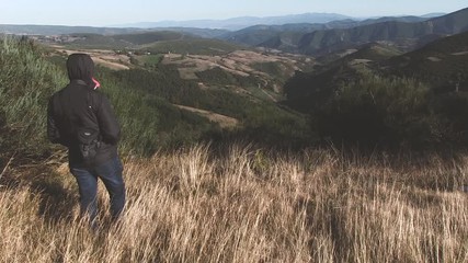 MAN WATCHING PEDRAFITA DO CEBREIRO MOUNTAIN