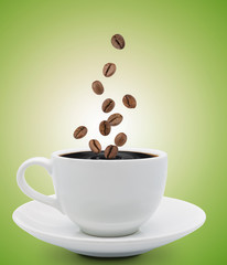 coffee beans falling into cup