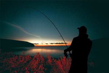 Man fishing on river on summer day