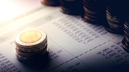 Coins on account book
