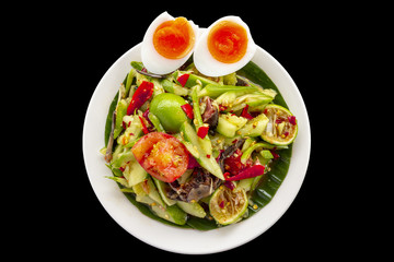Spicy cucumber salad with boiled eggs