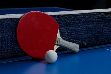 Ping pong. Accessories for table tennis racket and ball on a blue tennis table. Sport. Sport game.