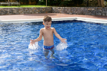 boy in swimming pool