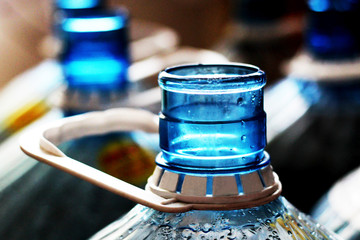 The neck of a large bottle of water