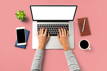 Overhead shot of woman working on laptop