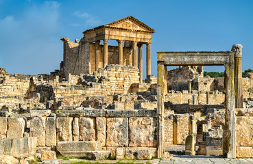 Fototapeta premium The Roman Capitol at Dougga. UNESCO heritage site in Tunisia