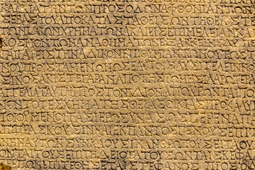 Fototapeta na wymiar Ancient greek script, Celsus Library, Ephesus Turkey